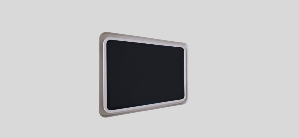 Apple iPad recessed into a SeeLess white flush in-wall mount, featuring a sleek curved frame and minimalist grey background.
