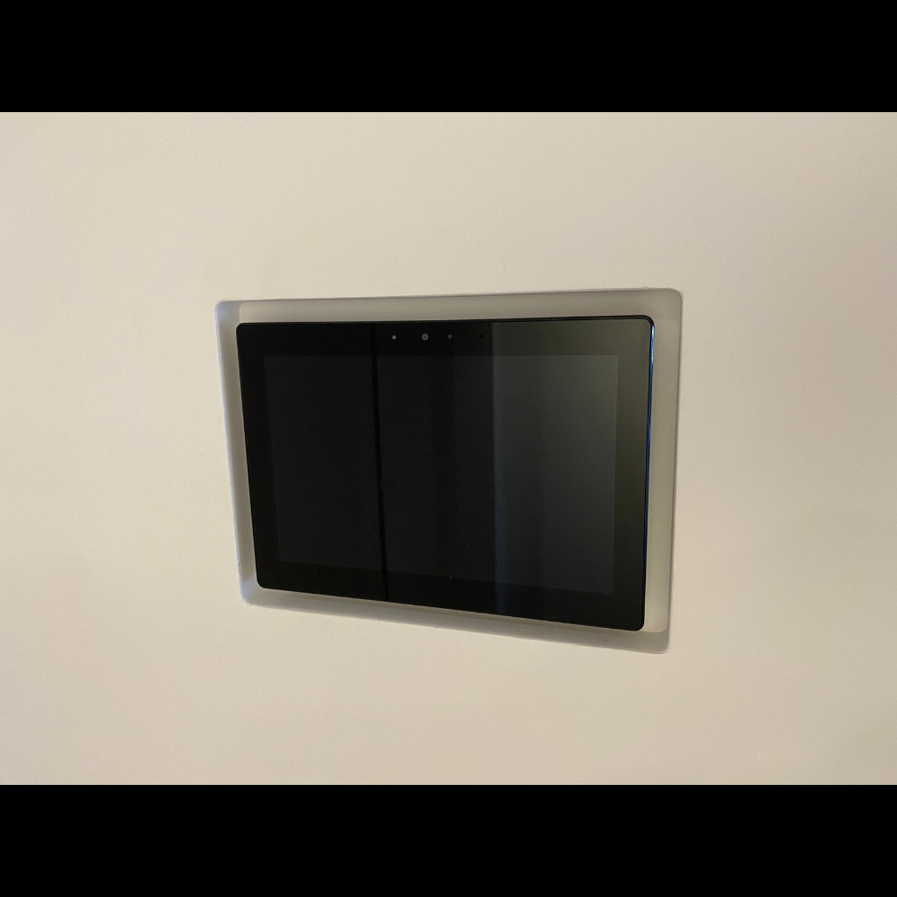 Seamless wall integration of Control4 8&quot; Touch Panel using SeeLess gypsum flush mount.