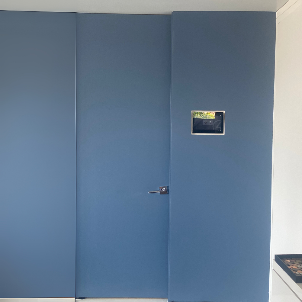 Control4 8” Touch Panel mounted in SLD-TPC48-375 in-wall platform — flush and trimless installation.