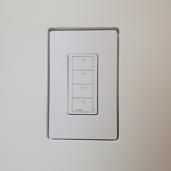 Front View of Mud-In Mount with Lutron Faceplate. Designer style with One Fourth inch reveal.