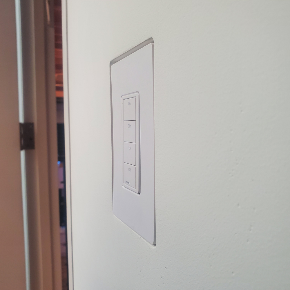 Front View of Mud-In Mount with Lutron Faceplate. Designer style with One Fourth inch reveal.