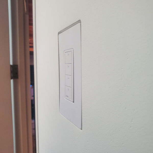 Left Side View of Mud-In Mount with Lutron Faceplate. Designer style with One Fourth inch reveal.