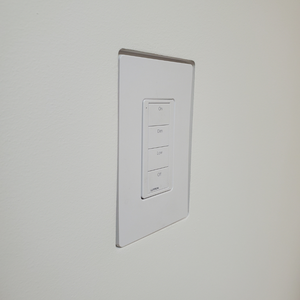 Right side of Mud-In Mount with Lutron Faceplate. Designer style with One Fourth inch reveal.