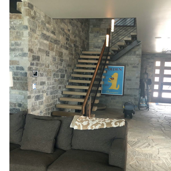 Modern smart home wall with ELAN 8″ touch panel integrated via SeeLess SLS‑TPS8E‑062 platform.