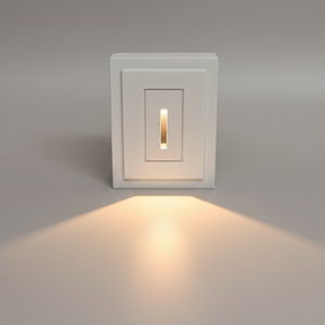 SeeLess miniature step light: SL-3005-062 rectangular profile with 1/16" reveal  with glowing warm light