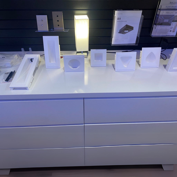 Display of a variety of paintable seeless form factors of step light plaster mounts