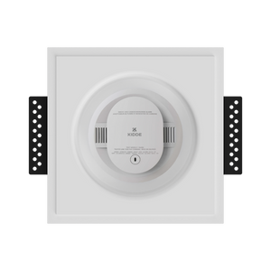 Front view of SMR-1GU-153x52 in-wall mount with round smoke/sensor device, demonstrating minimalist design integration