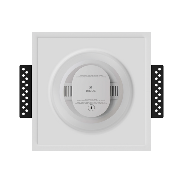 Front view of SMR-1GU-153x52 in-wall mount with round smoke/sensor device, demonstrating minimalist design integration