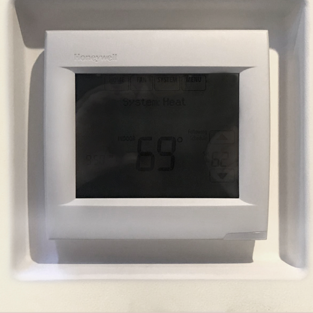 Universal square thermostat flush in-wall mounting platform by SeeLess — front angled view.