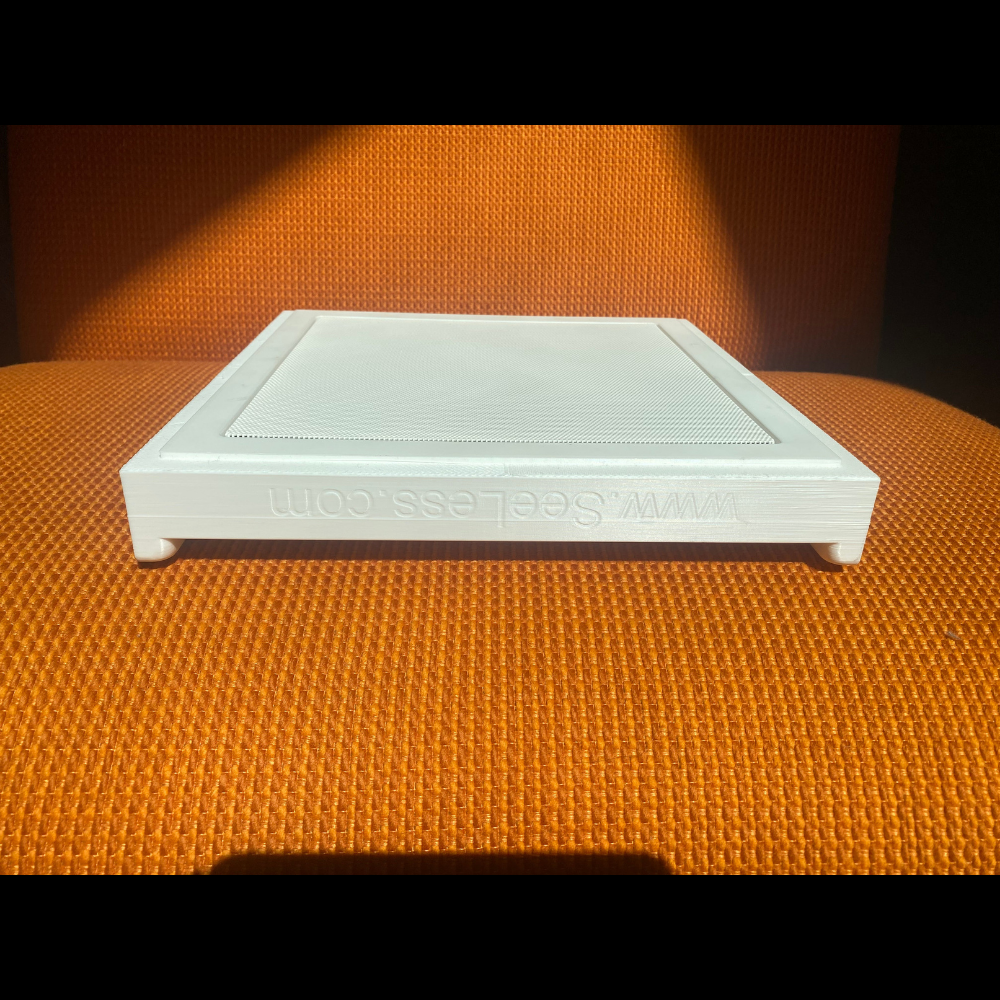 Angled front view of SL-WICS7S-030 highlighting flush fit with ICS7a in-ceiling speaker