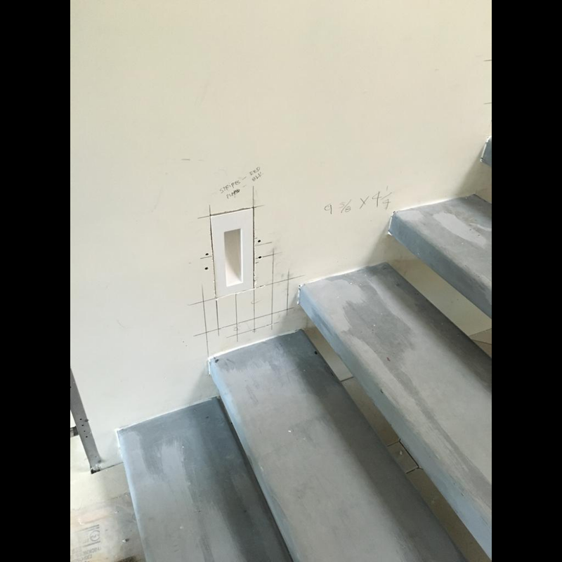 Step-by-step installation of SeeLess step light flush mount into drywall

